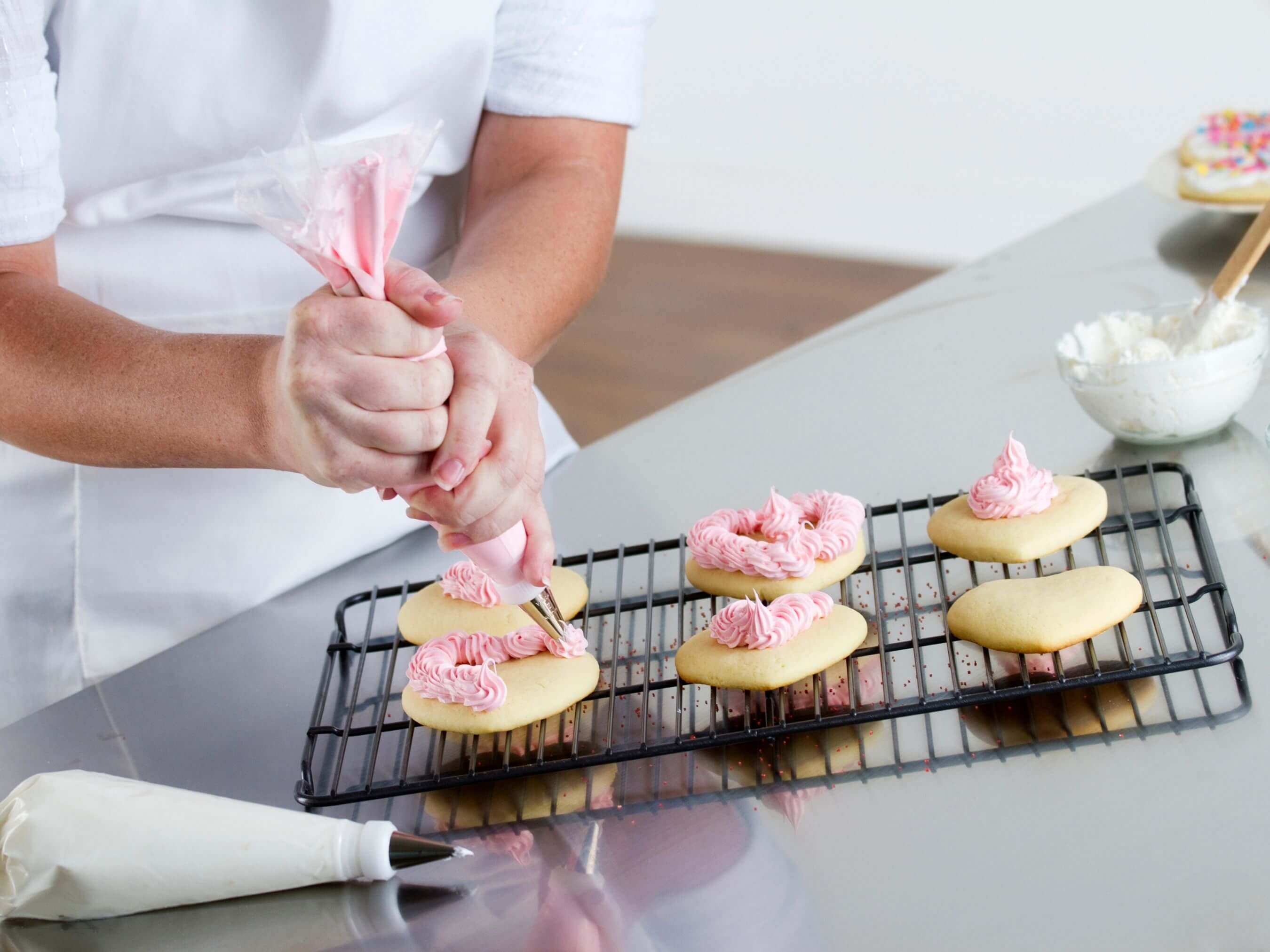 woman decorating cookies